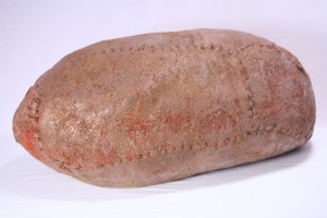 POD(Rednet), 2013, 10 x 22 x 10", wool, beeswax, thread, netting, pigment, recycled fill; hand felted, stitched, encaustic.