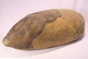 POD(Patched), 2014, 11 x 39 x 13", wool, beeswax, thread, recycled fill; hand felted, stitched, encaustic.